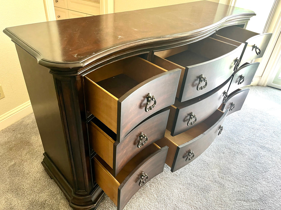 Pulaski 9 drawer curved front dresser with mirror 32566
