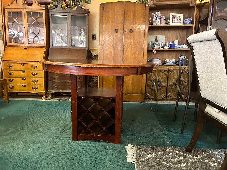 Solid wood round wooden kitchen or dining table with wine rack base 34000