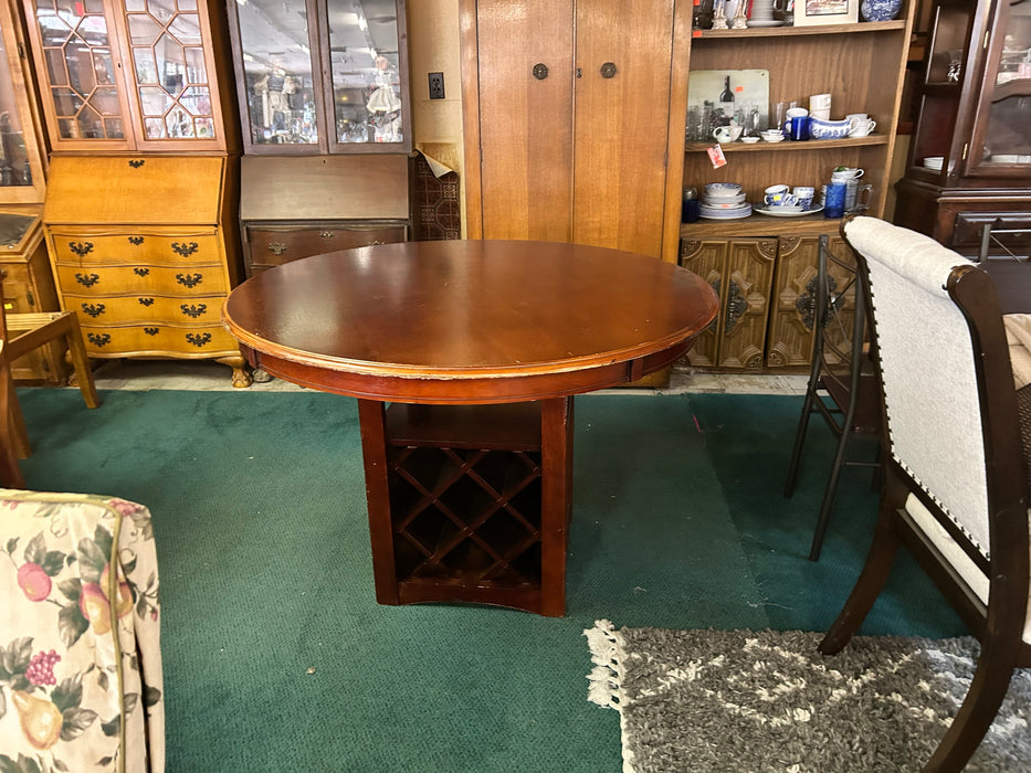 Solid wood round wooden kitchen or dining table with wine rack base 34000