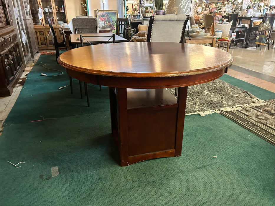 Solid wood round wooden kitchen or dining table with wine rack base 34000