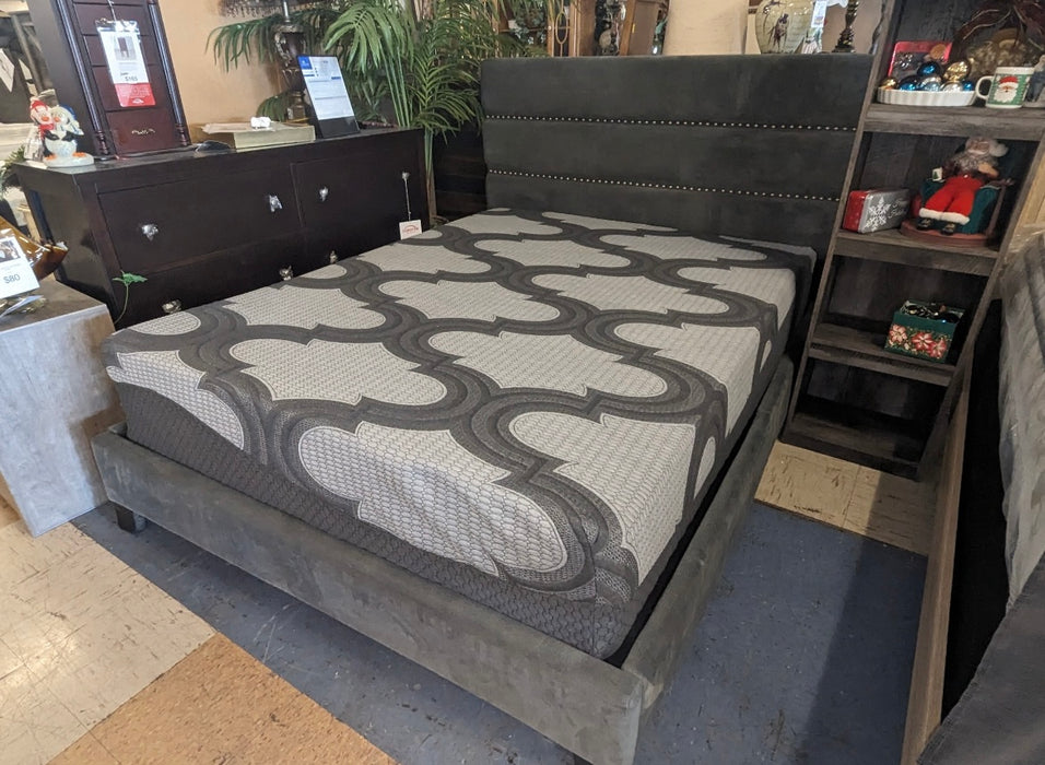 Upholstered with nail head accents queen bed 33236