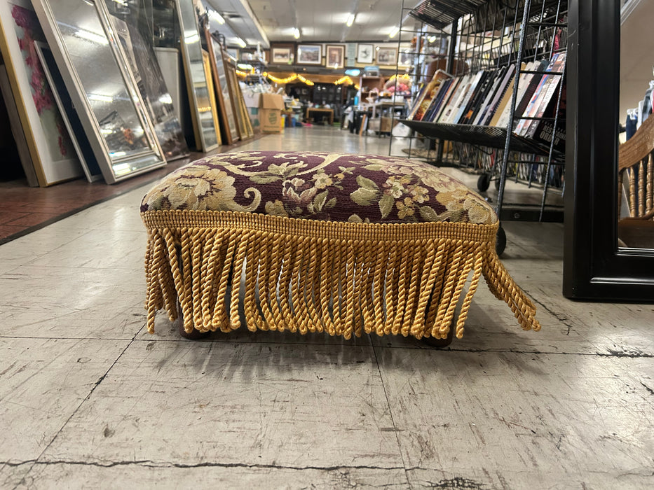 Small upholstered western foot stool with fringe 34081
