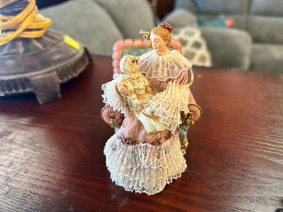 The house of Louis Nichole lady with child ornament 33607