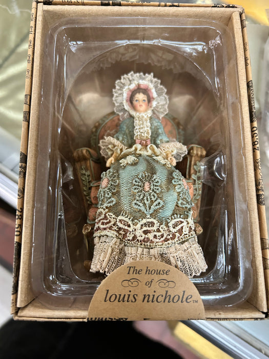 The House of Louis Nichole lady in chair Christmas ornament 33618