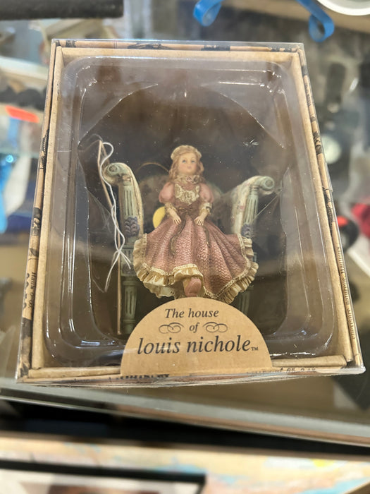 The House of Louis Nichole Girl in chair Christmas ornament 33619