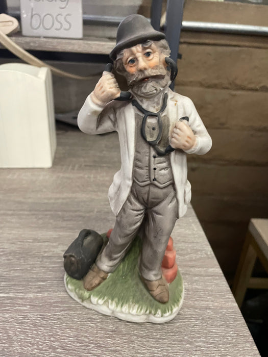Vintage doctor figurine with stethoscope 31613