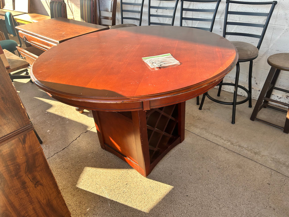 Solid wood round wooden kitchen or dining table with wine rack base 34000