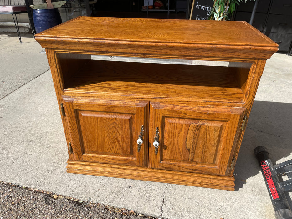 Oak TV stand cabinet on casters 33152