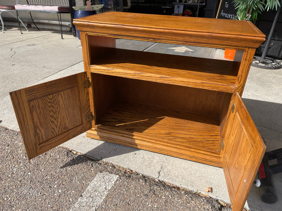 Oak TV stand cabinet on casters 33152