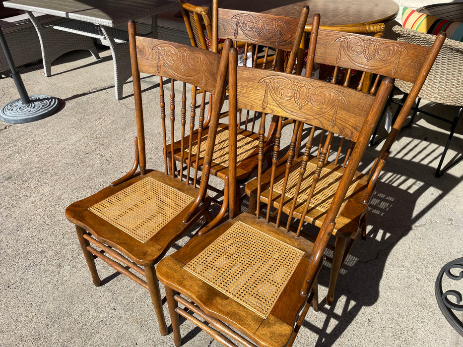 Vintage wood dining chairs carved back with cane seat 31504
