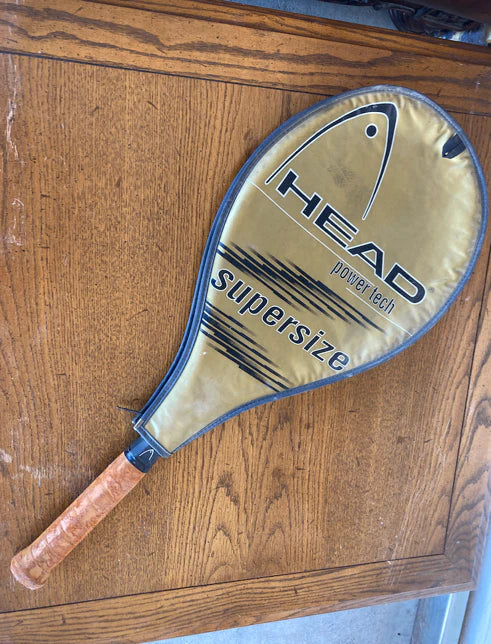 Tennis racket with head power tech supersize cover 23908