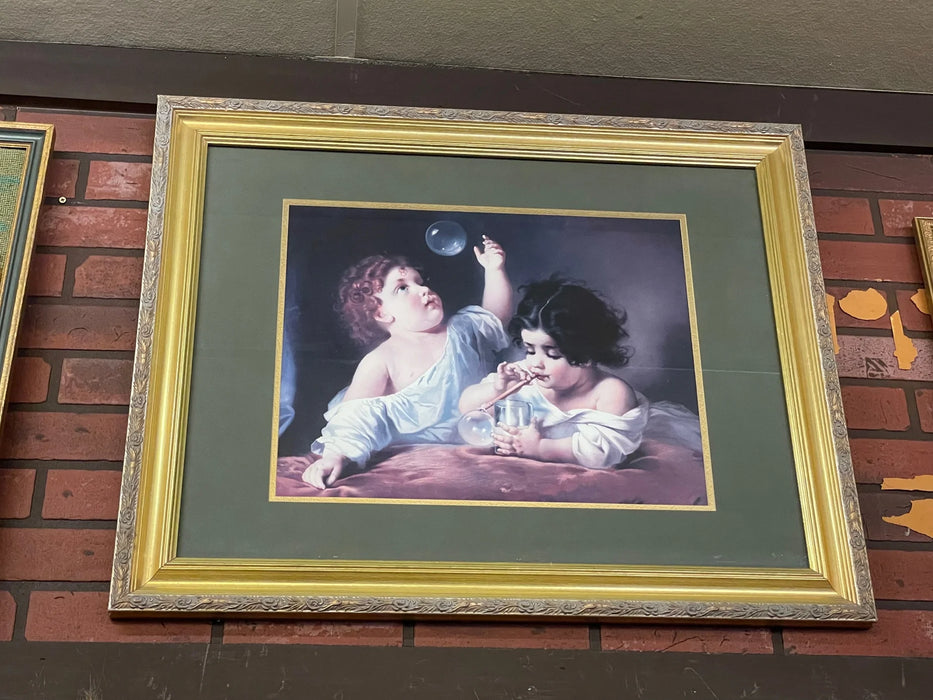 Printed picture of 2 babies blowing bubbles, framed and matted 25455