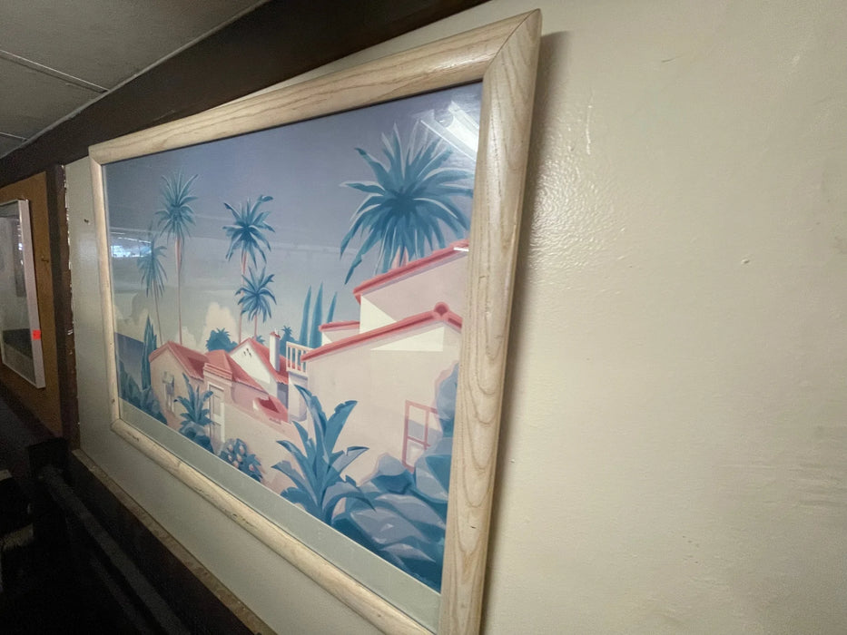 Printed picture of palm trees near house with red roofs on a sunny day, white wood frame 25457