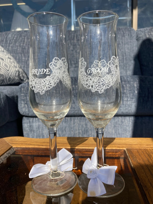 Etched bride & groom champagne glasses 27409
