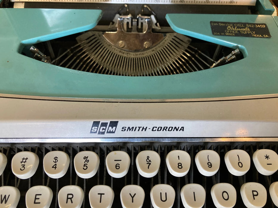 Smith Corona SCM aqua typewriter in case 27960