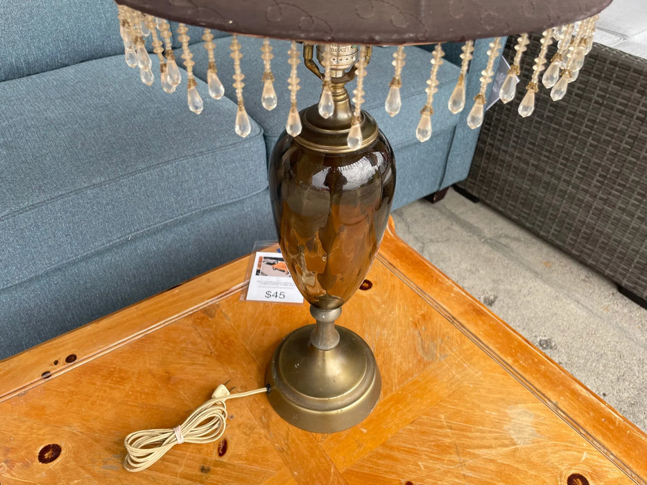 Amber colored glass lamp with crystal prisim and embroidered shade 28313
