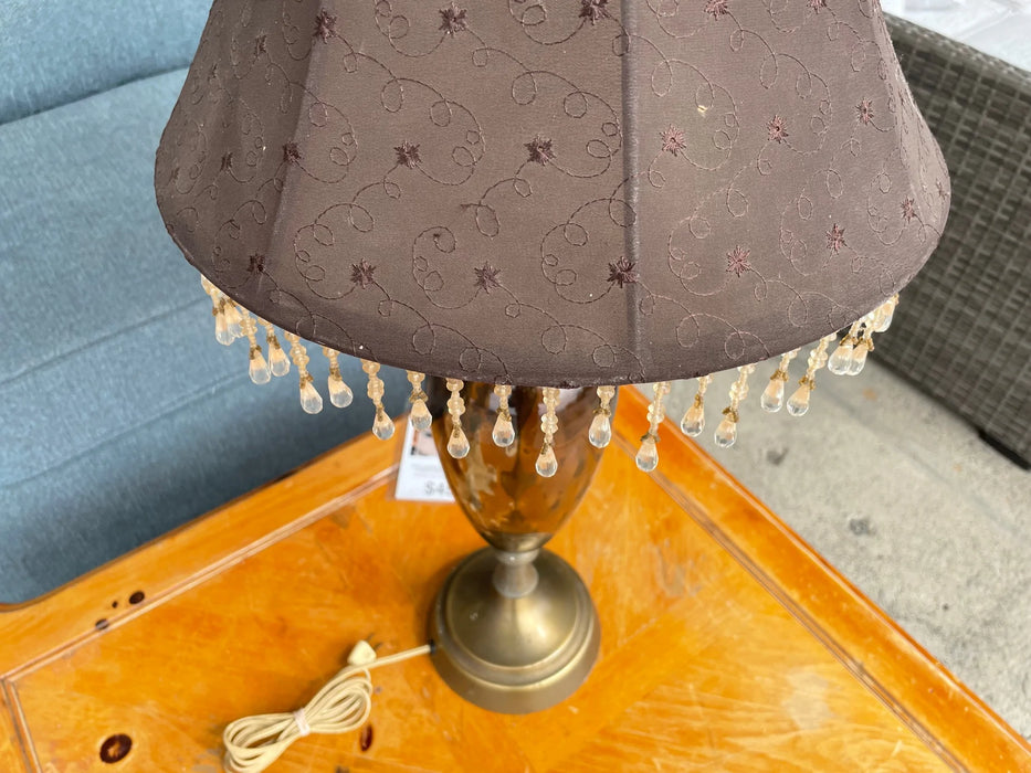 Amber colored glass lamp with crystal prisim and embroidered shade 28313