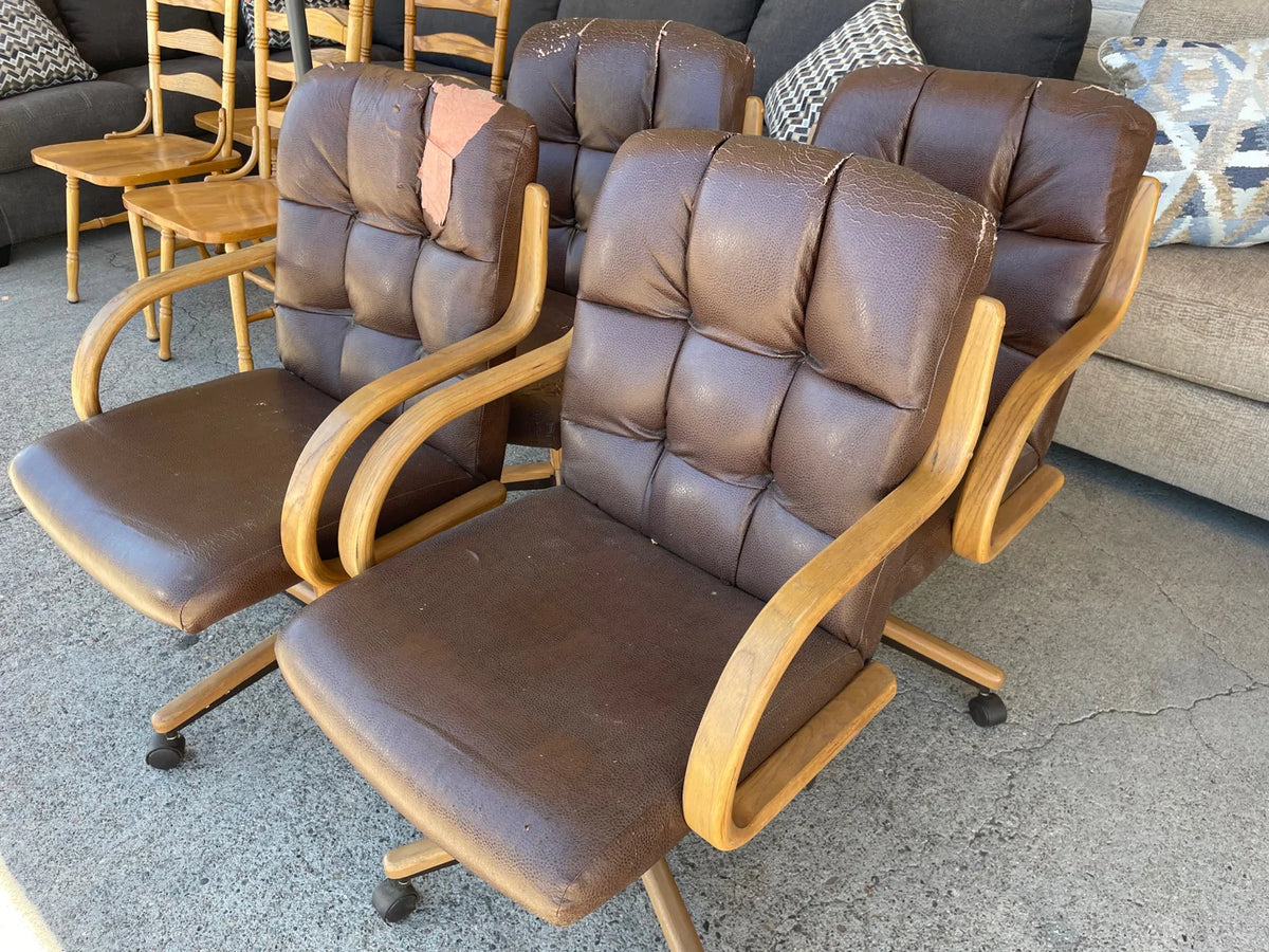 Faux leather dining or desk chairs with rollers 28956