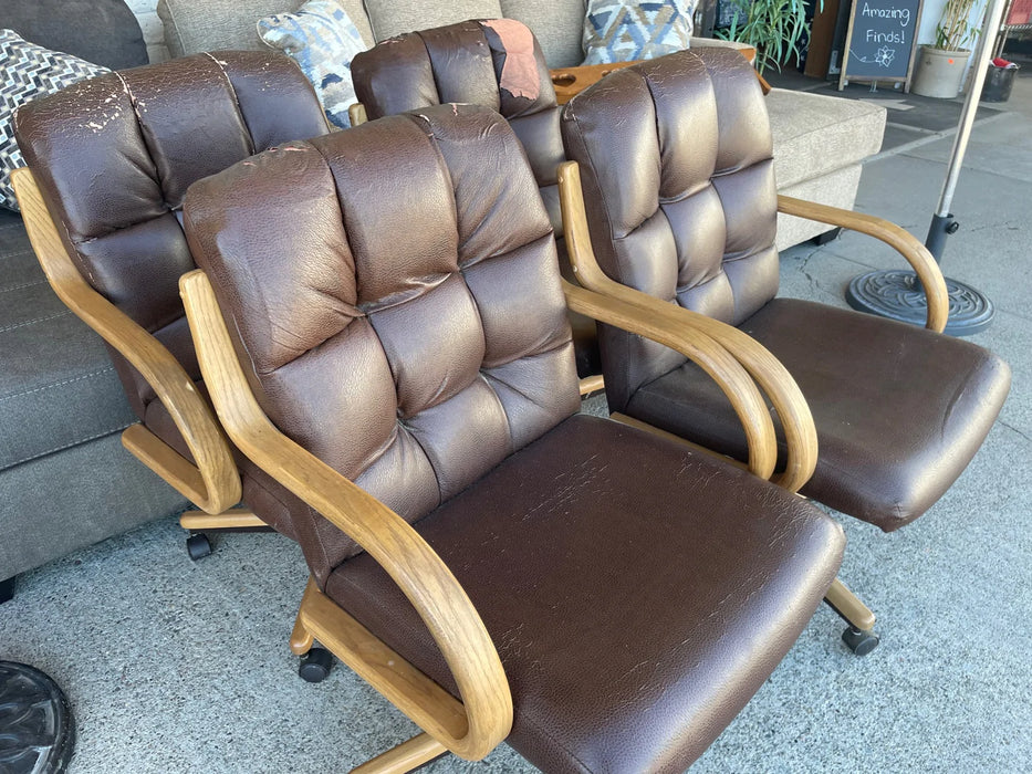 Faux leather dining or desk chairs with rollers 28956