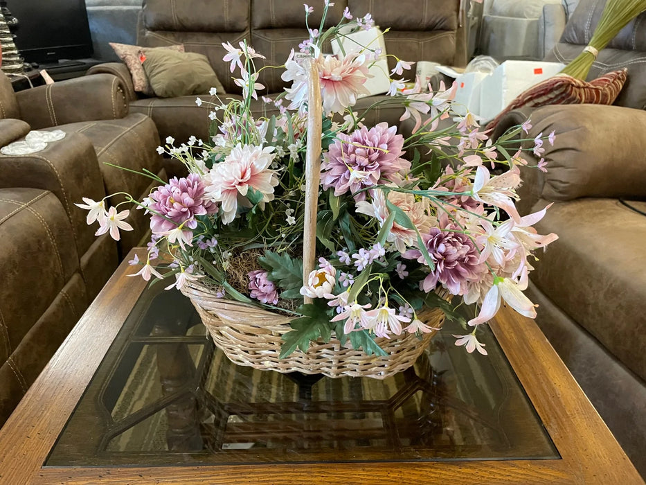 Pink/purple floral arrangement with wicker basket 29240
