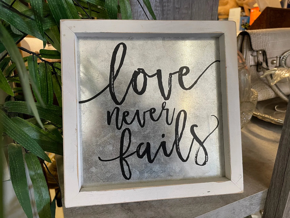 Love never fails sign 29681